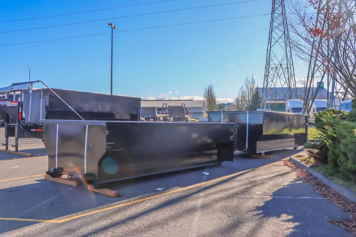 Roll-off dumpster ready for waste disposal at job site for Commercial Dumpster Rental in Kochville